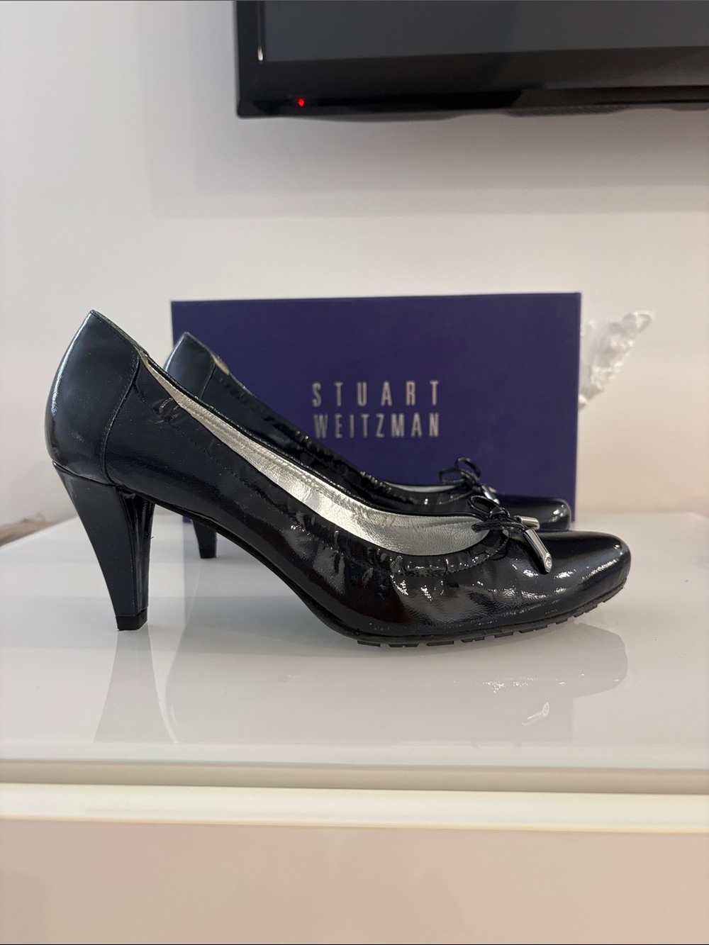 Stuart Weitzman Black Patent Leather Pumps with Bow Accent